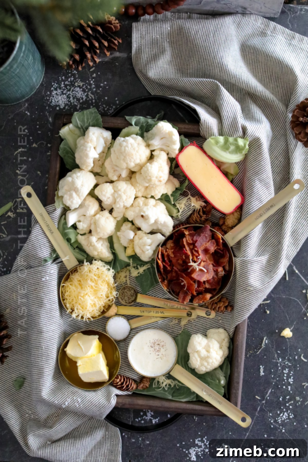 Ingredients for making creamy cauliflower mash laid out.