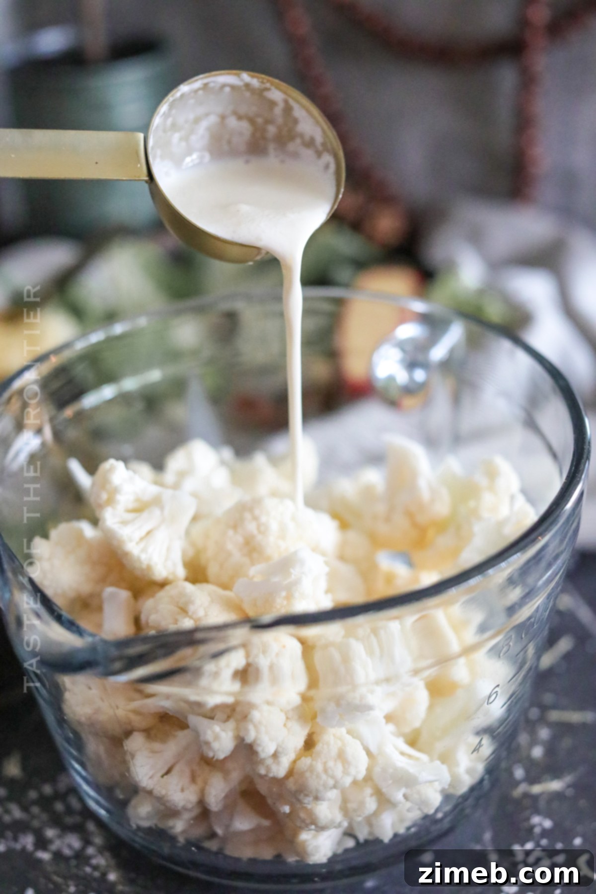 Process of making cauliflower mash, showing mashed florets in a bowl.