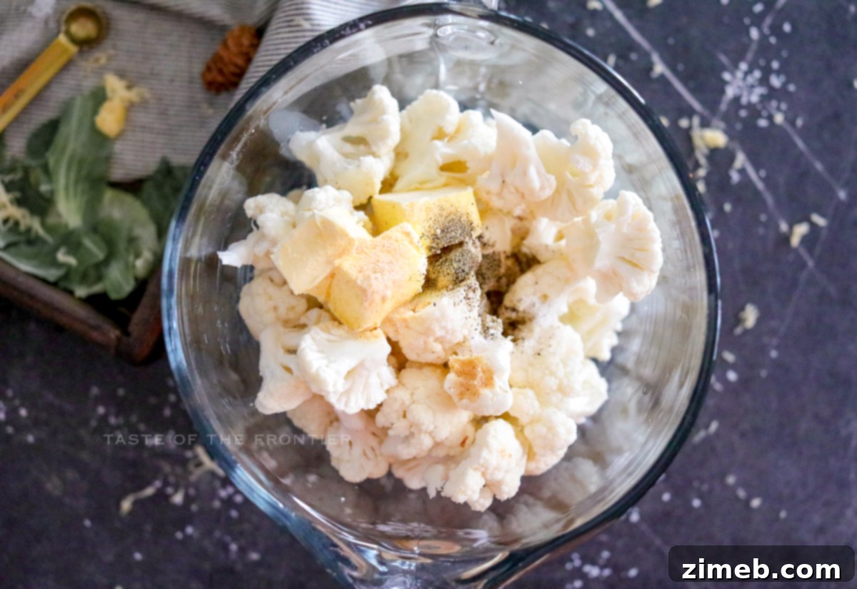 Keto-friendly cauliflower mash garnished with fresh herbs.
