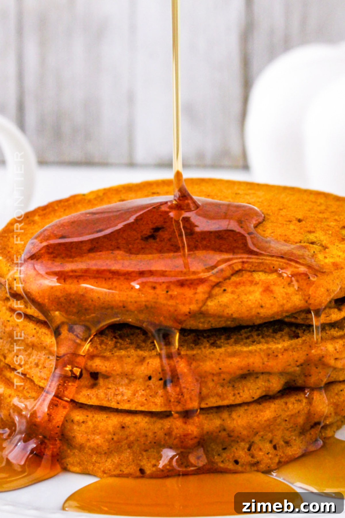 Pumpkin pancakes with maple syrup