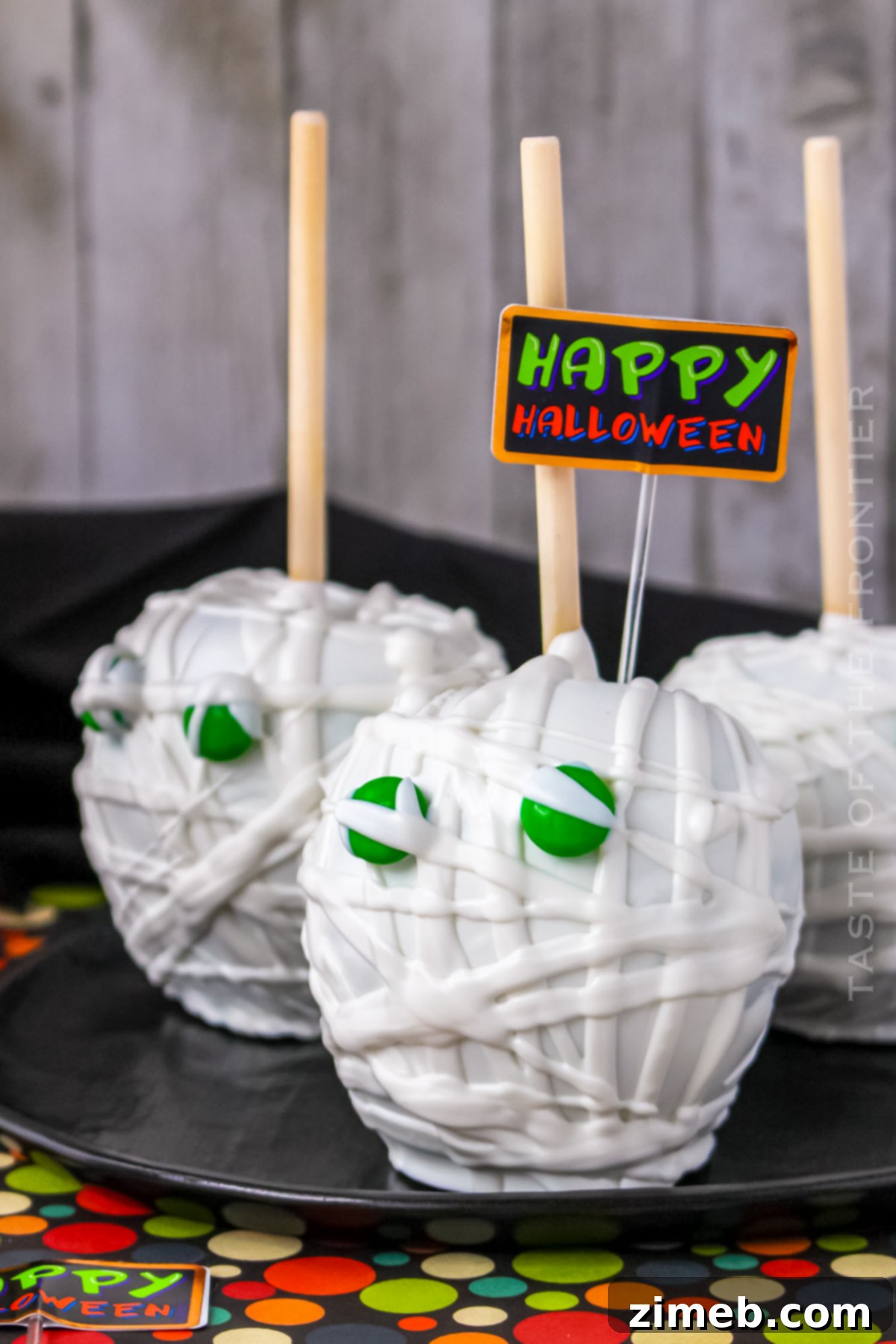 Candy Apple Mummies 19 Halloween party treats featuring Mummy Candy Apples