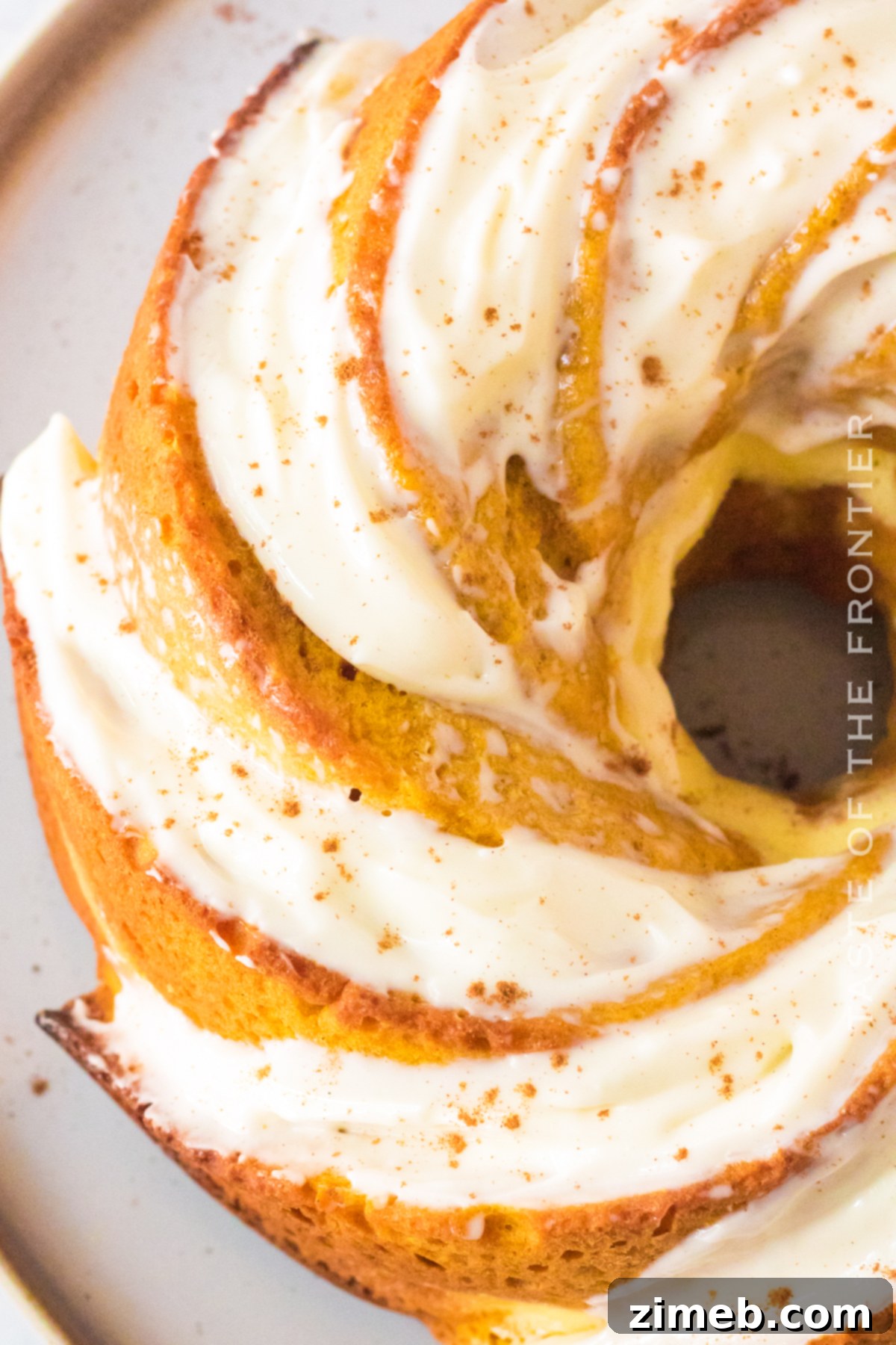 Golden Pumpkin Bundt with Cheesecake Surprise 3 pumpkin swirl cake with cheesecake filling