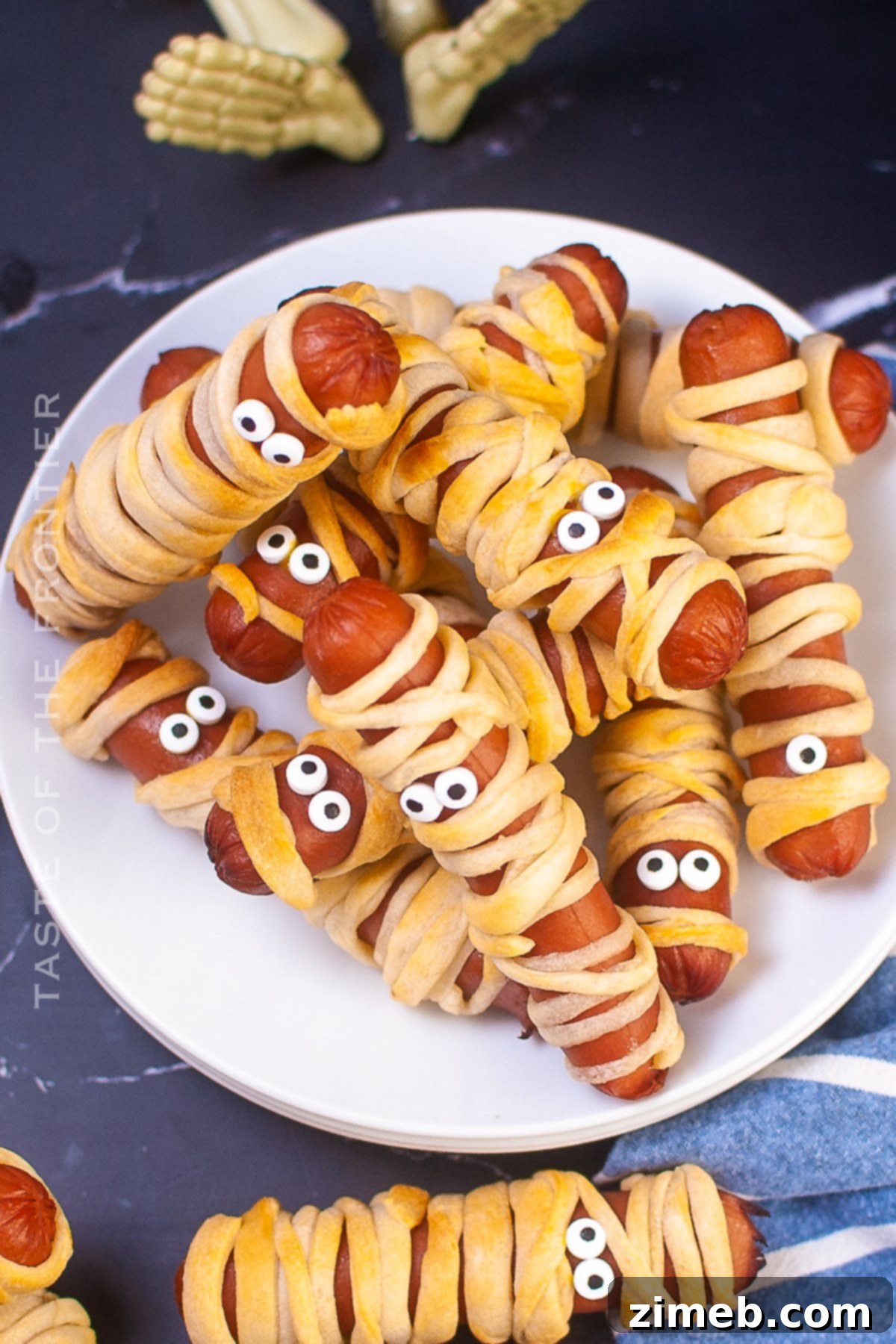 Phantom Franks 2 Delicious and easy Halloween Mummy Dogs, perfect for parties and spooky fun.