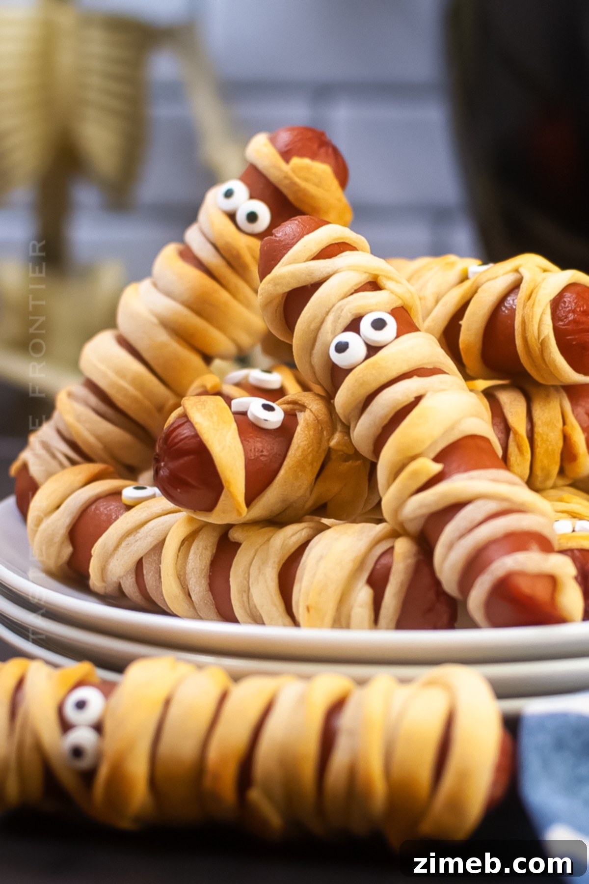 Phantom Franks 20 Halloween dinner recipes, including Mummy Dogs, for a festive meal.