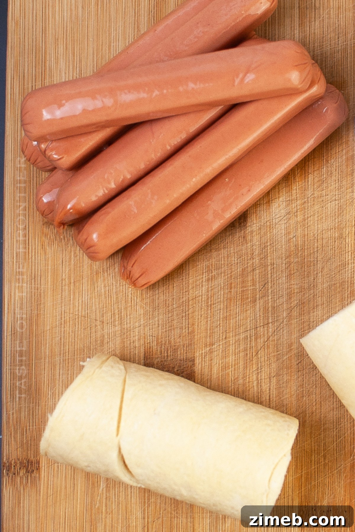 Phantom Franks 6 Step-by-step image of wrapping hot dogs in dough to create Mummy Dogs.