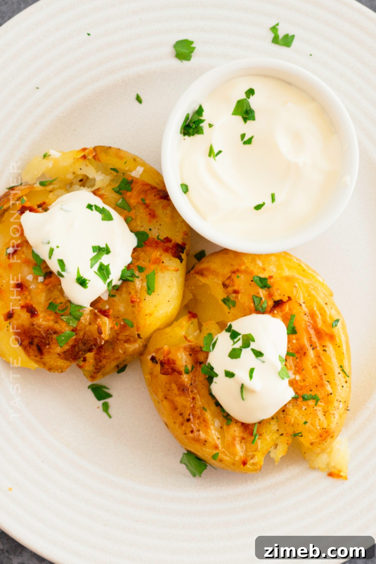 Crispy Smashed Potatoes 20 A beautiful spread of festive holiday side dishes, including golden smashed potatoes, perfectly arranged for a grand celebration.