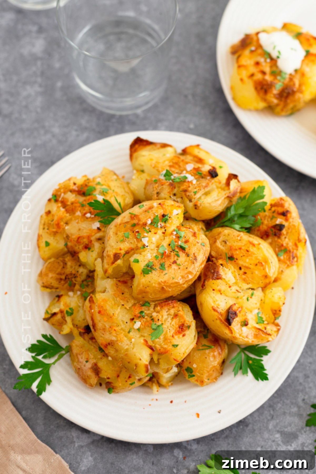 Crispy Smashed Potatoes 10 A beautiful spread of festive holiday side dishes, including golden smashed potatoes, perfectly arranged for a celebration.