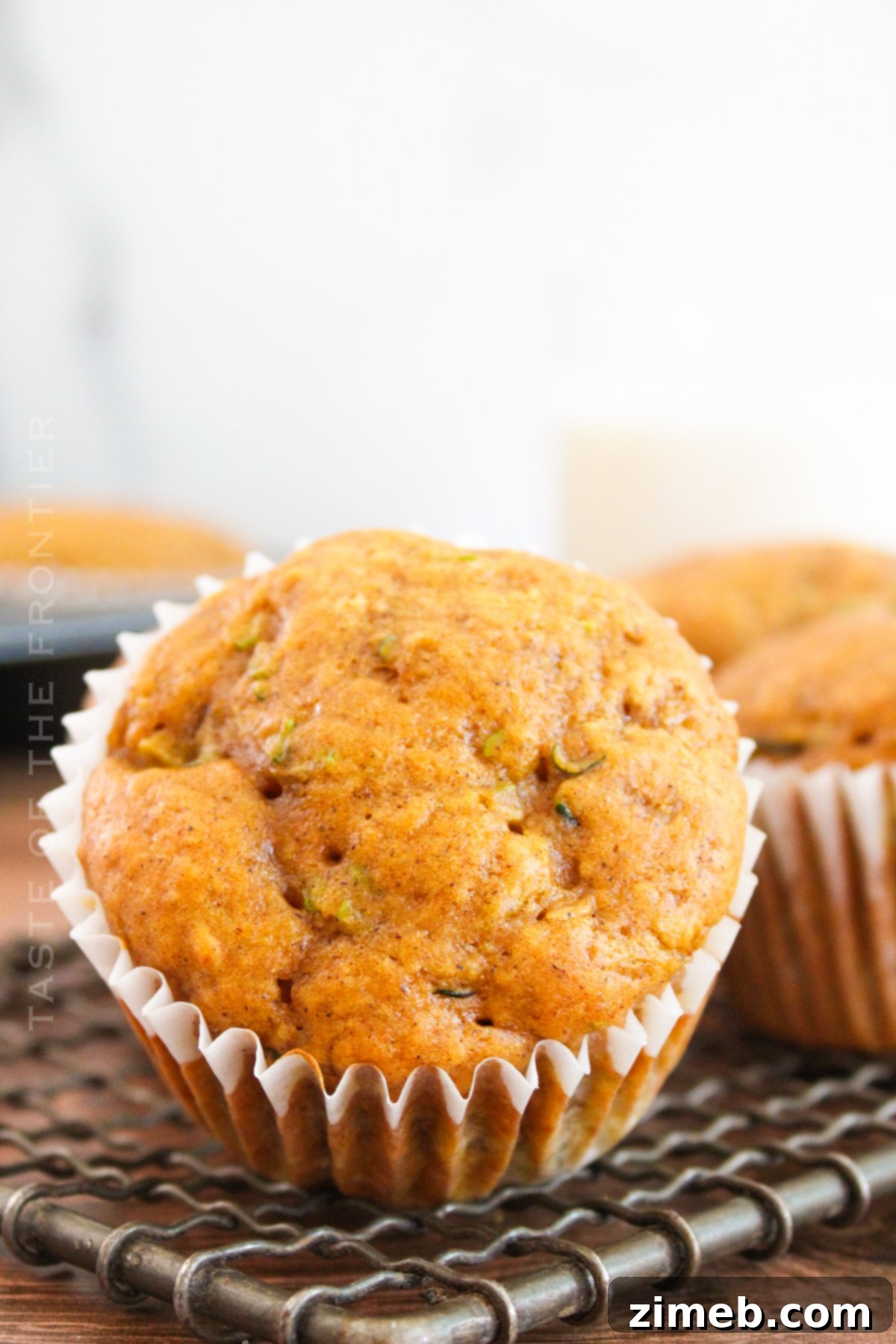Spiced Autumn Zucchini Pumpkin Delights 2 Moist and flavorful Pumpkin Zucchini Muffins, perfect for a fall morning