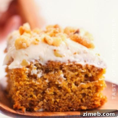 Recipe image for a moist and flavorful Pumpkin Spice Cake with cream cheese frosting.