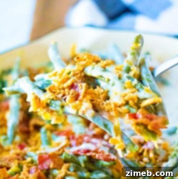 Green Bean Casserole loaded with bacon and crispy onions.