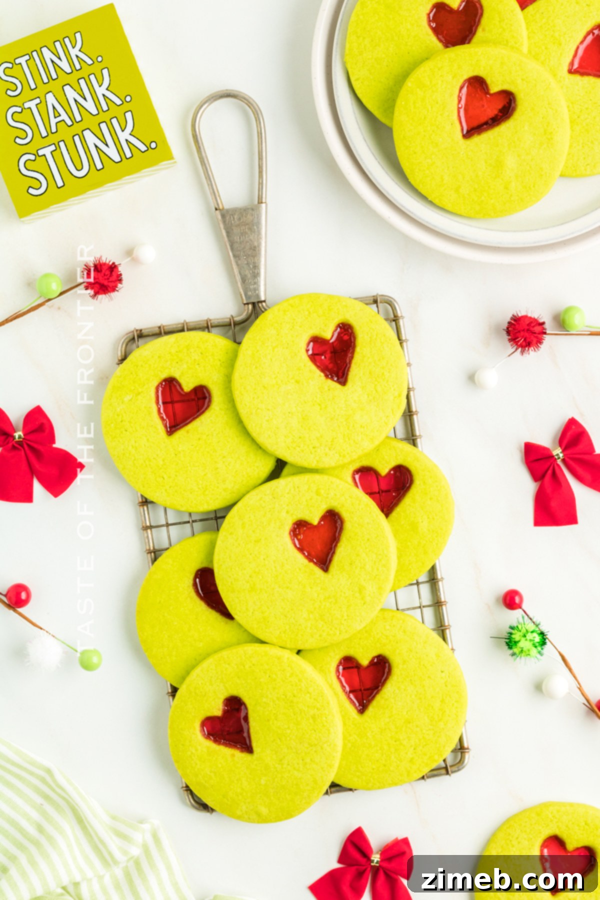 Stack of festive Grinch Christmas Cookies, ready to be enjoyed.