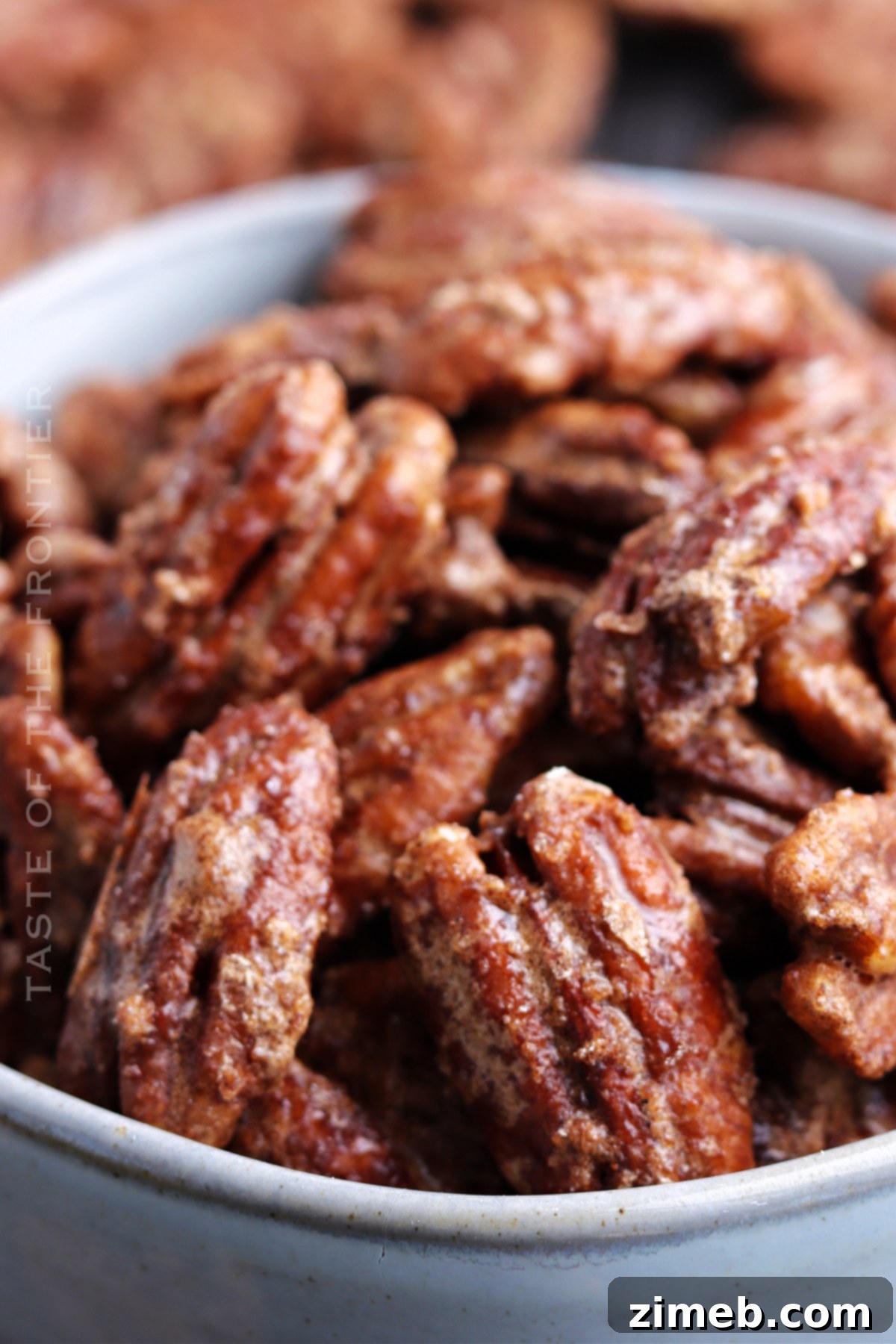 Sweet Glazed Pecans 18 Thanksgiving snack - Candied pecans for holiday gatherings.