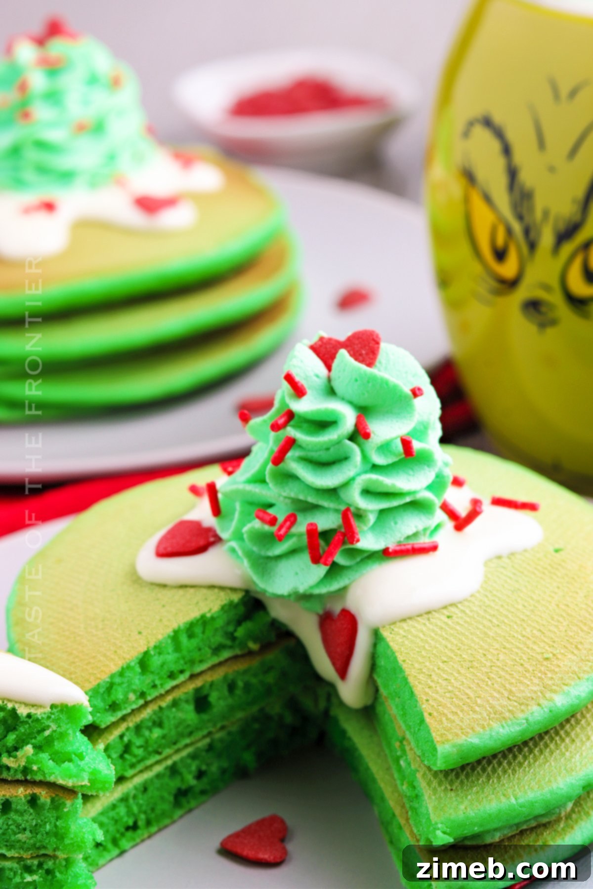 Grinch Green Flapjacks 18 Cute holiday Grinch pancakes stacked on a plate