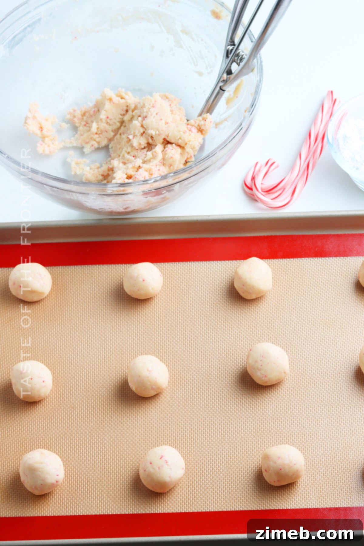 Winter Mint Snowball Delights 8 Rolling the cookie dough into balls for baking