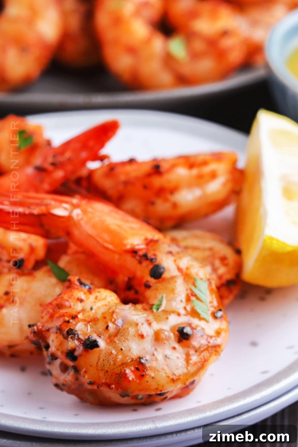 Savory Smoked Shrimp 15 Platter of freshly smoked shrimp, garnished with lemon wedges, serving as an enticing appetizer.