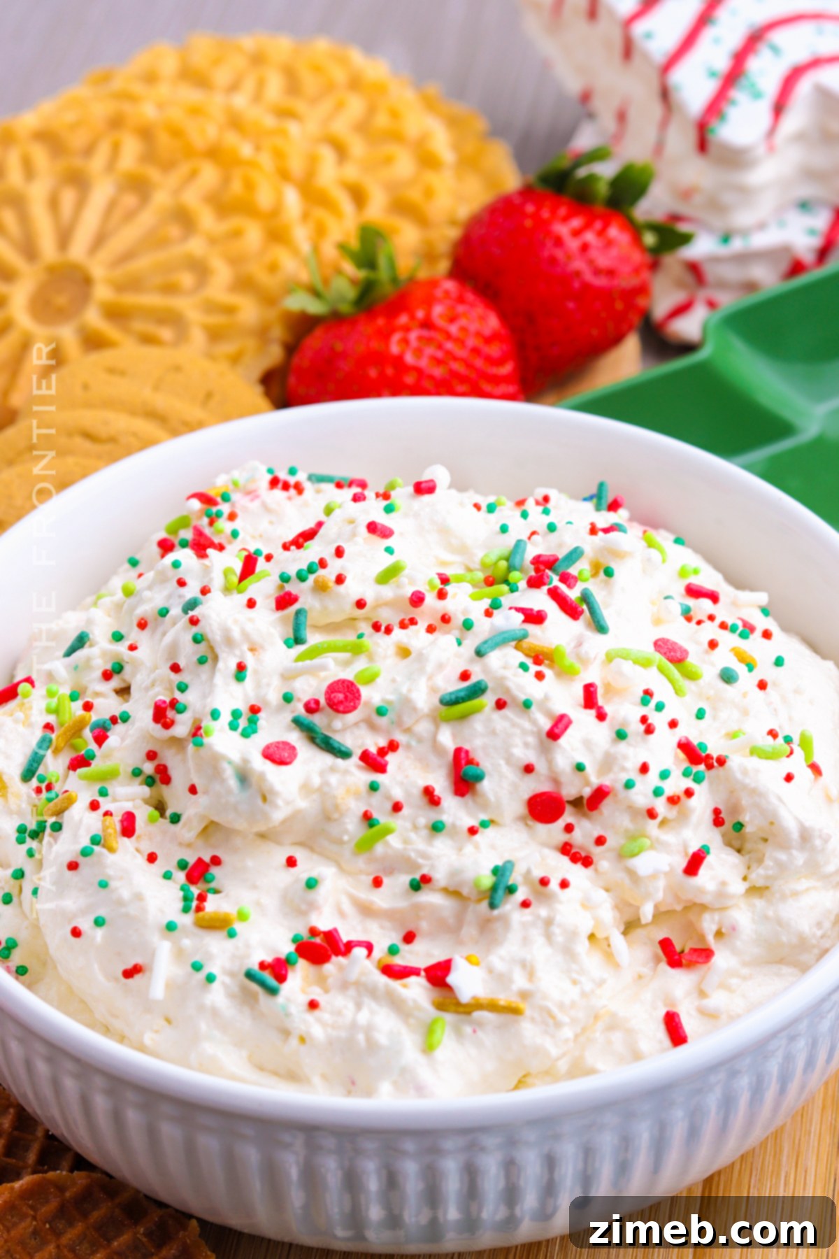 Magical Little Debbie Christmas Tree Dip 2 Little Debbie Christmas Cake Dip Recipe - a creamy, festive dip with chunks of Christmas Tree Cakes and sprinkles.