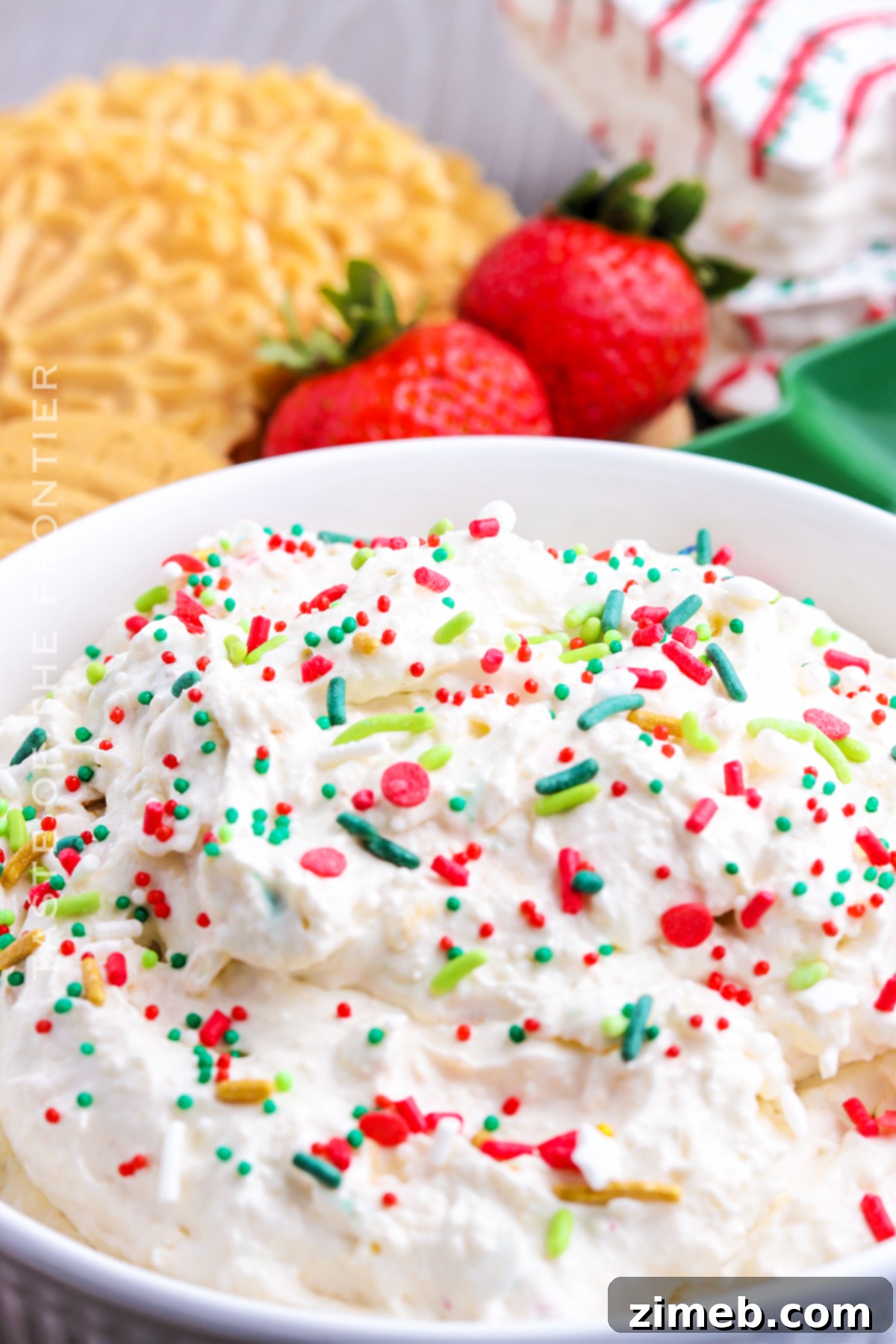 Magical Little Debbie Christmas Tree Dip 16 Little Debbie Christmas Cake Dessert - a bowl of the dip on a festive table.
