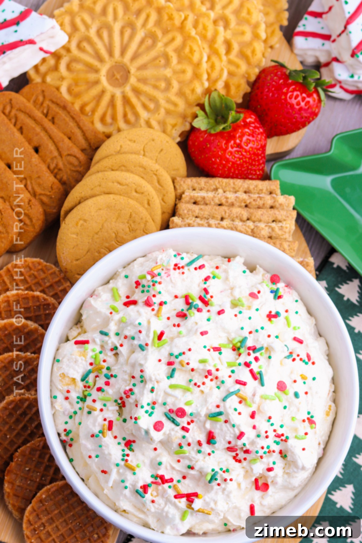Magical Little Debbie Christmas Tree Dip 3 Creamy Dessert Dip with cake pieces, served with dippers like cookies and graham crackers.