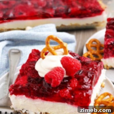 Raspberry Pretzel Salad, a classic Midwestern layered dessert.