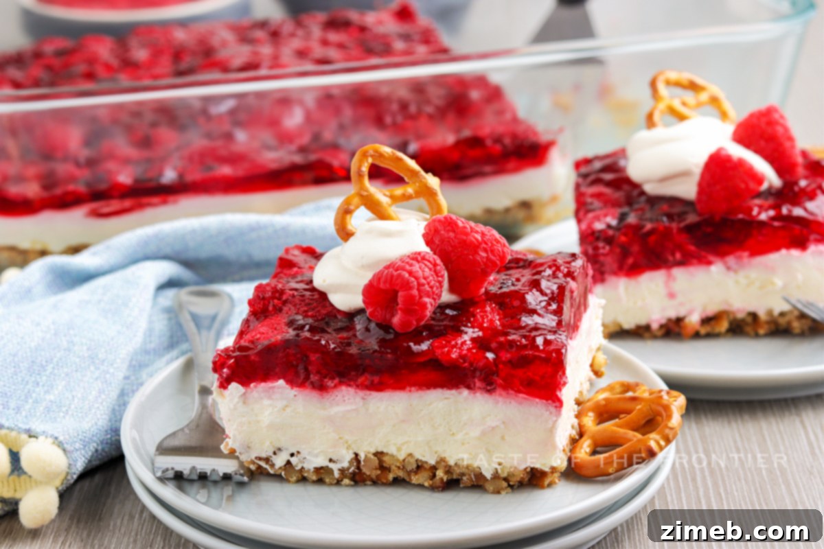 Salty Sweet Raspberry Dream 9 Raspberry Pretzel Salad, a perfect Thanksgiving or holiday dessert idea.