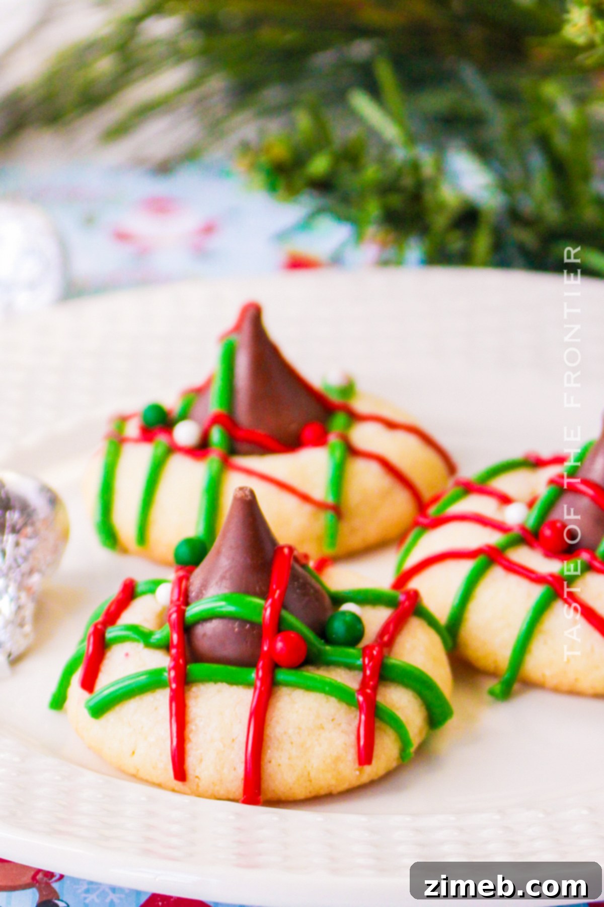 Buttery Christmas Shortbread 2 Delightful shortbread kiss cookies adorned with festive colors, perfect for holiday gatherings and cookie exchanges.