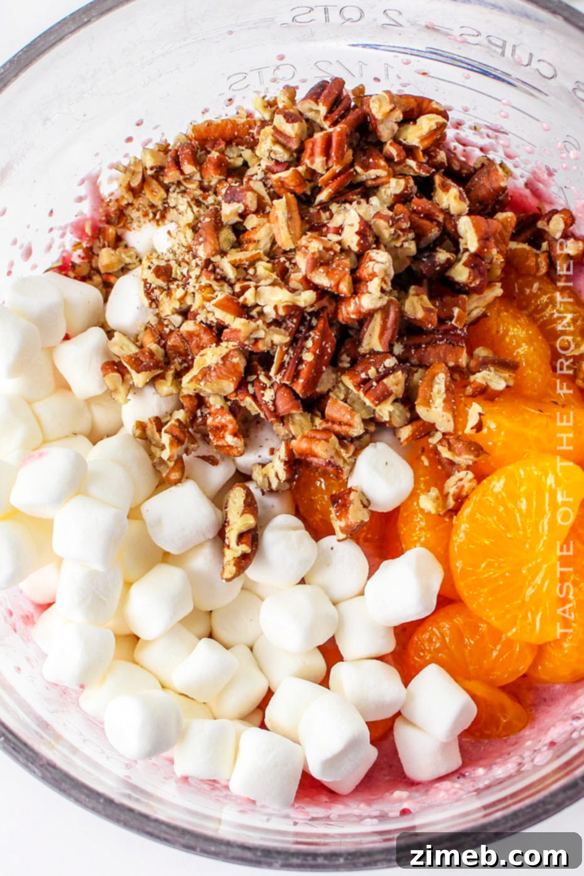 Bright and Flavorful Cranberry Salad 6 Cranberry fluff dessert in a bowl, showing the creamy texture and colorful ingredients.