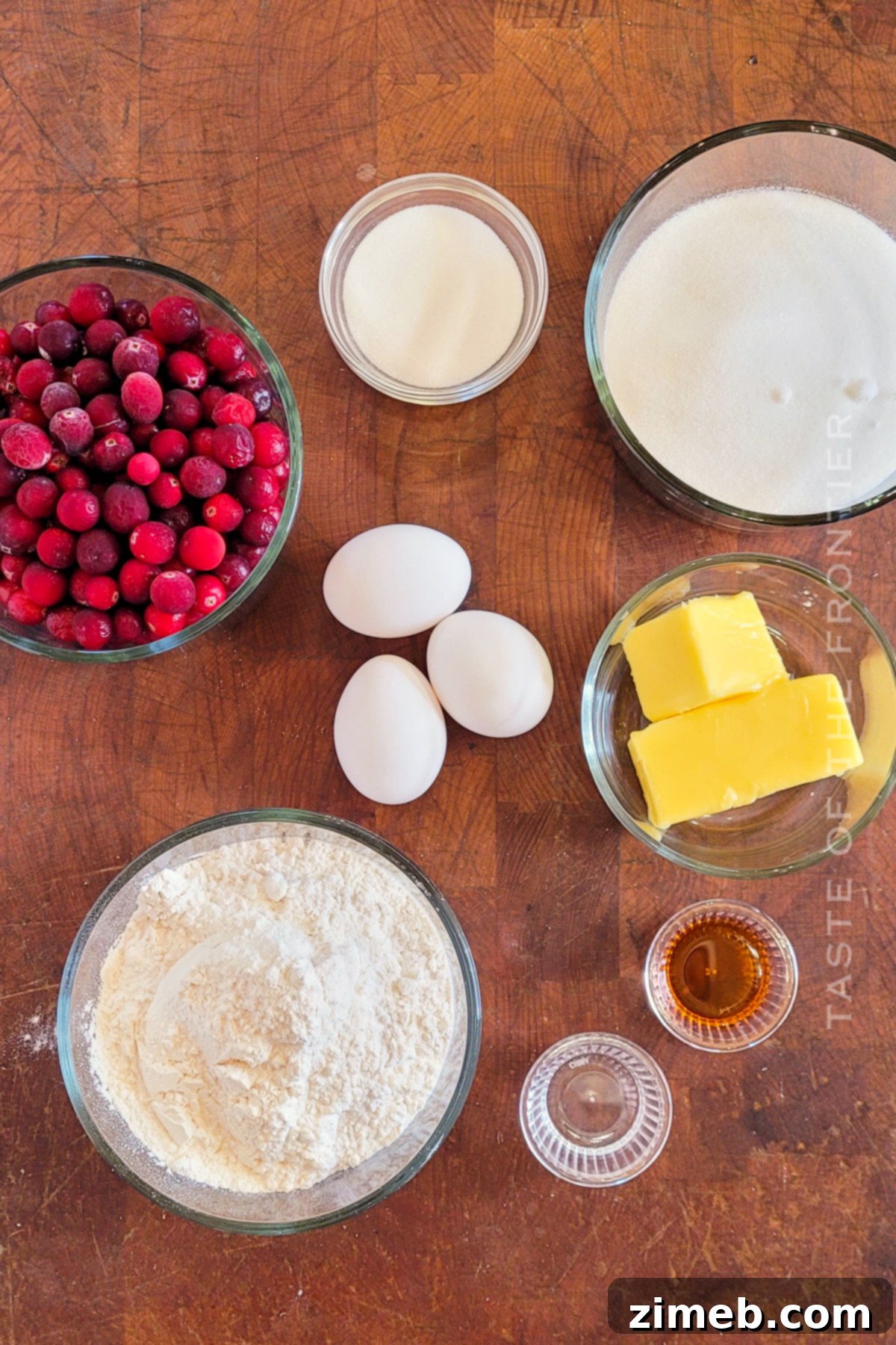 Fresh cranberries and other key ingredients laid out for making the cake.