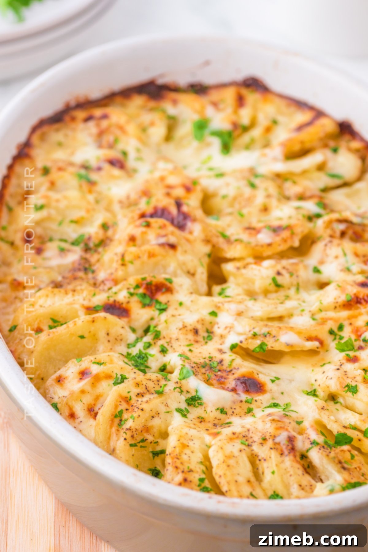 Creamy Cheesy Potato Layers 11 Comparison of Au Gratin vs. Scalloped Potatoes.
