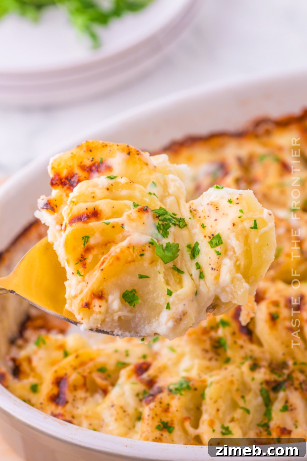 Creamy Cheesy Potato Layers 19 Finished Homemade Potatoes Au Gratin, a perfect recipe for any meal.