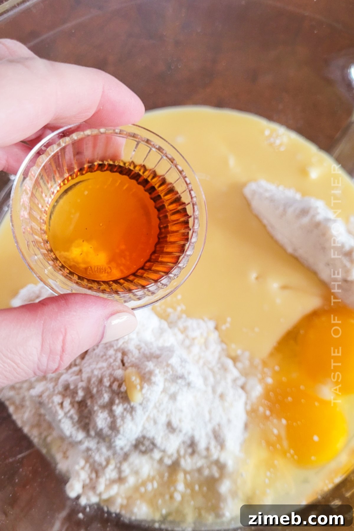 Easy Sugar Cookie Bars 7 Adding vanilla extract to Sugar Cookie Bar dough