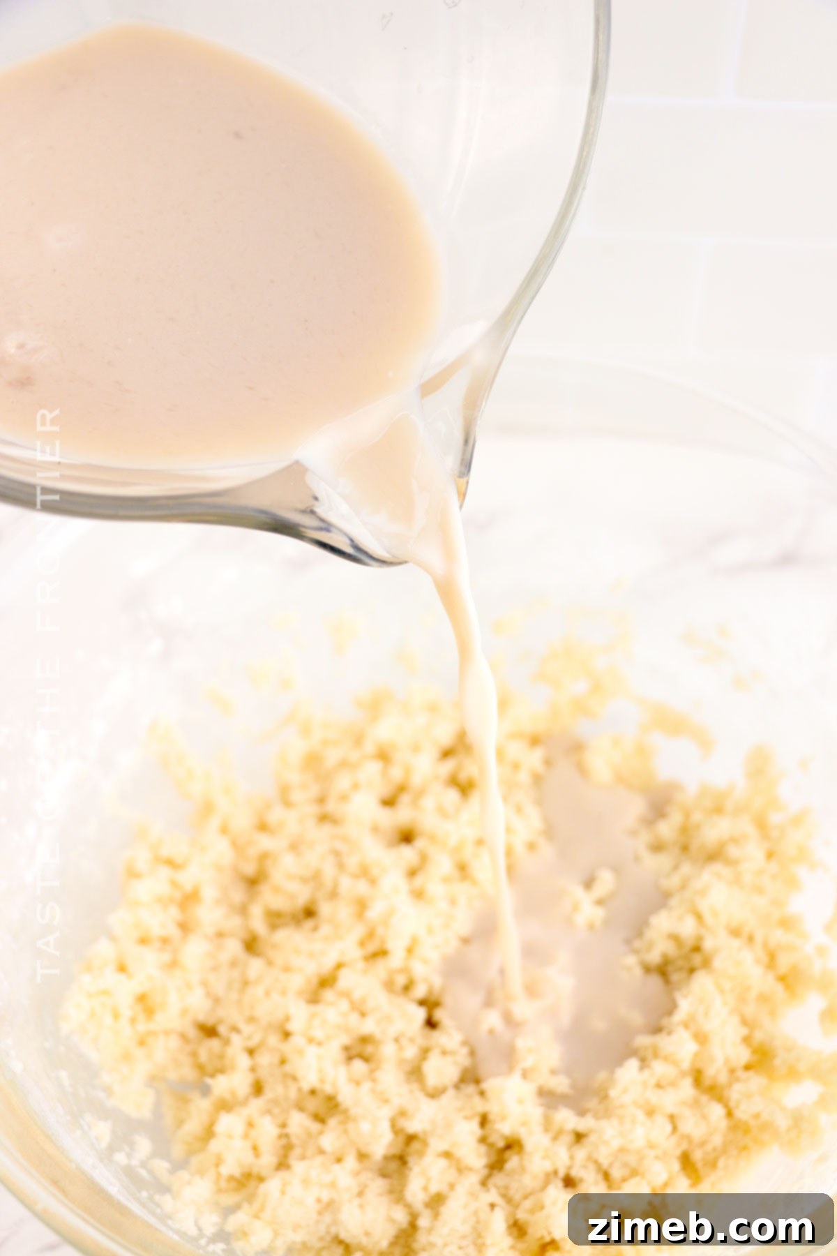 Petal Perfect Cake 5 Smooth vanilla cake batter in a mixing bowl