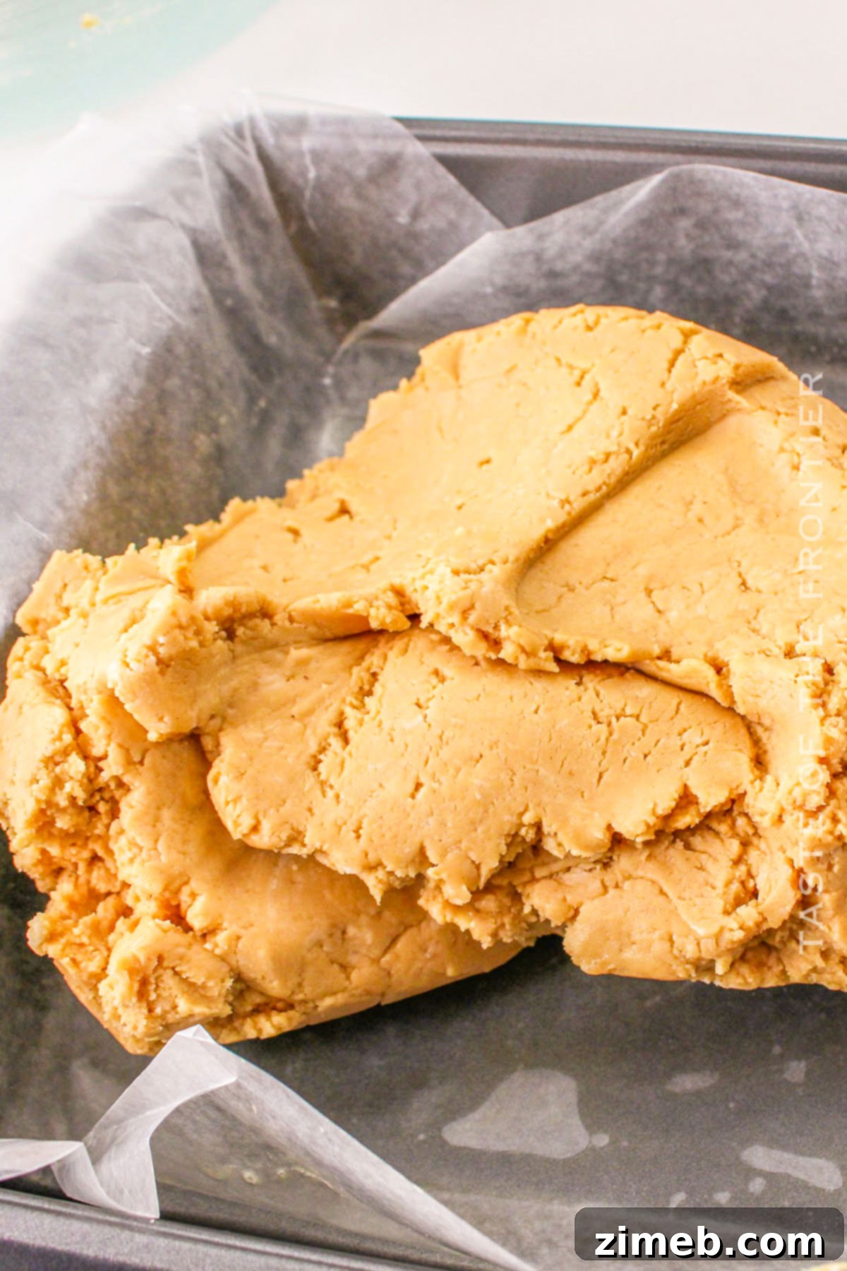 No-Bake Peanut Butter Fudge 6 spreading in the pan