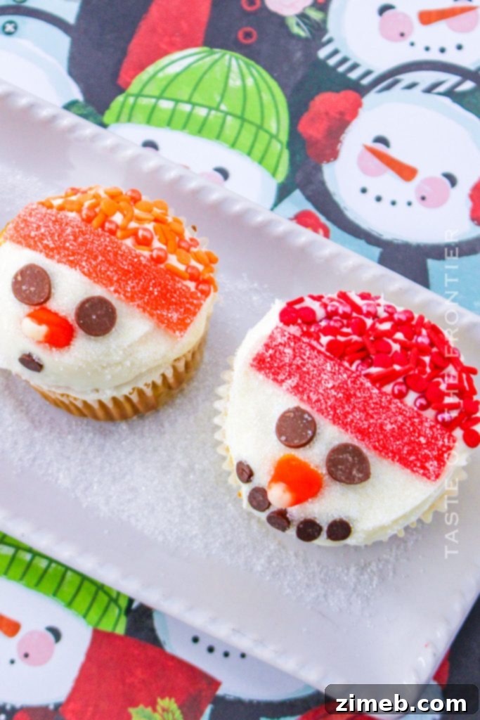 15 Joyful Christmas Cupcake Creations 7 Adorable Snowman Cupcakes with Candy Decorations