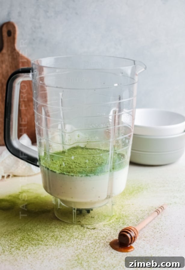 Matcha Refresher 4 Blender in action, mixing ingredients for a matcha shake
