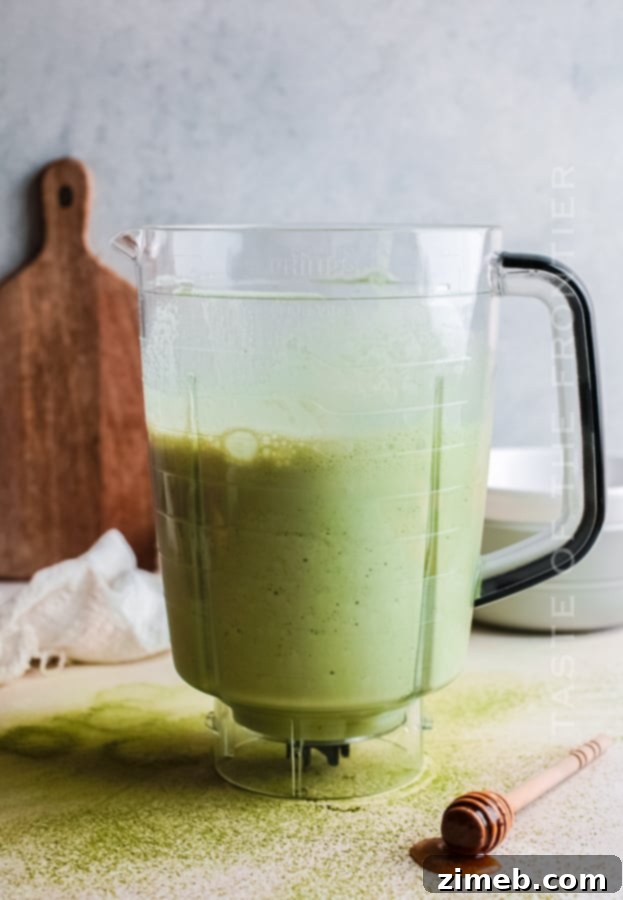 Matcha Refresher 6 Smooth, blended matcha shake poured into a glass