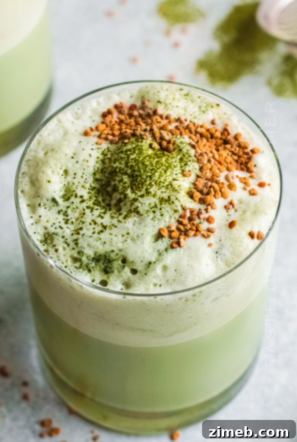 Matcha Refresher 8 Healthy breakfast green tea shake in a glass with a straw