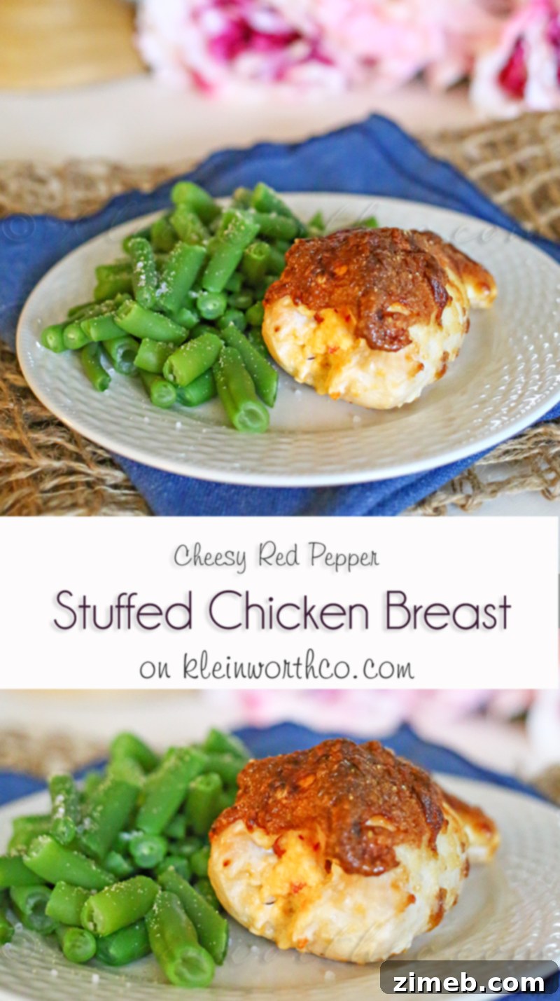 A close-up of a serving of Cheesy Red Pepper Stuffed Chicken Breast