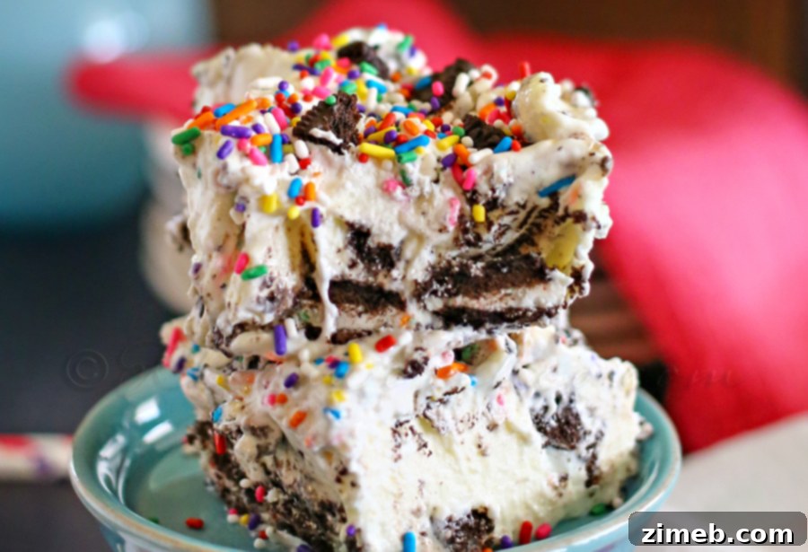 Colorful Cake Batter Oreo Cheesecake Dessert with a generous layer of sprinkles