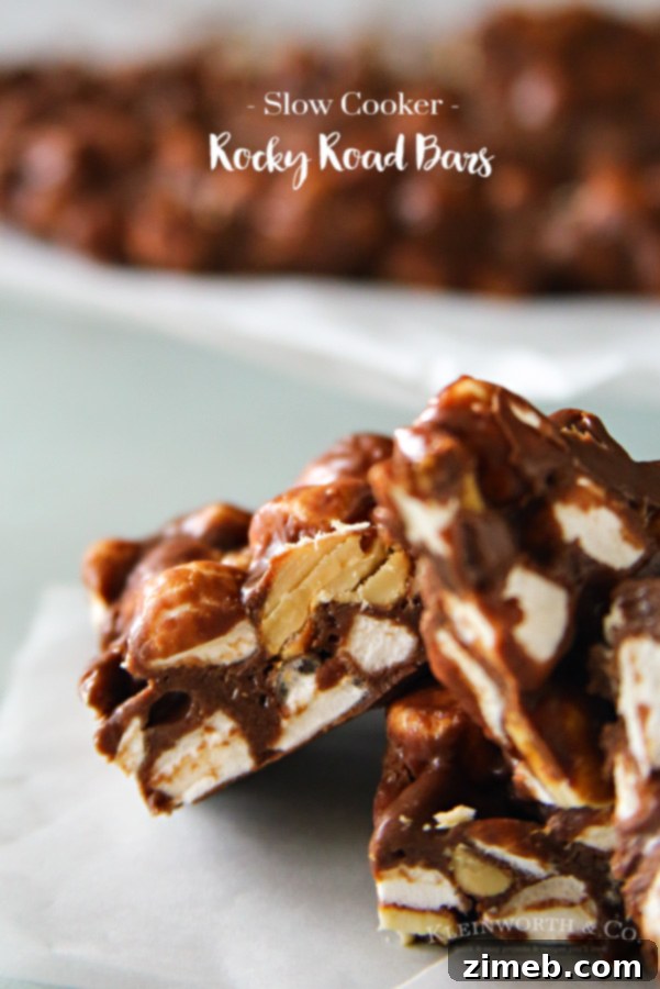 Effortless Slow Cooker Rocky Road Bars 6 Individual Slow Cooker Rocky Road Bars displayed on a serving platter.