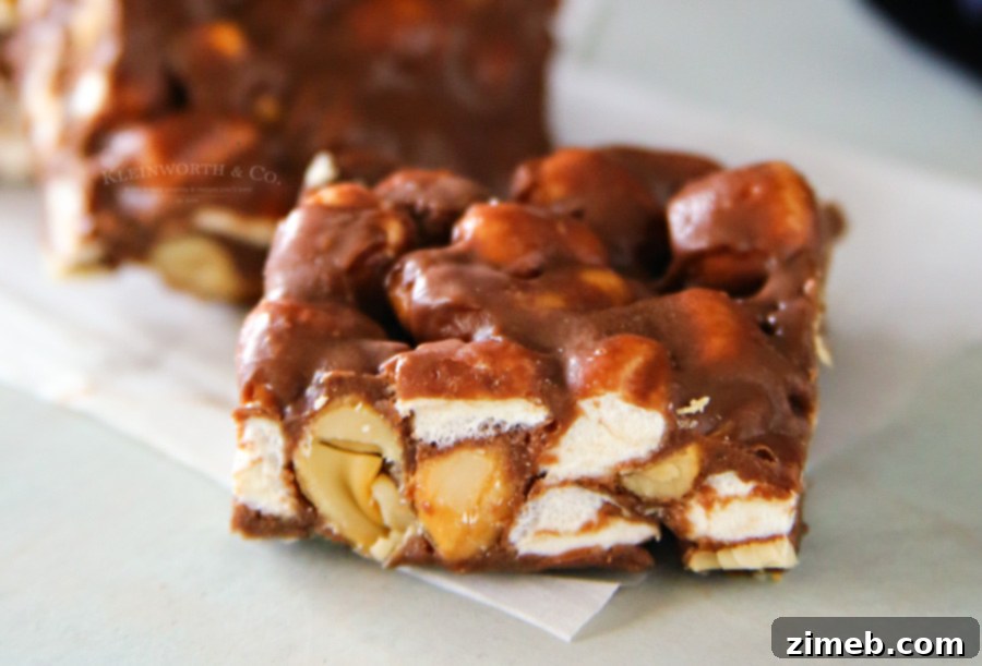 Effortless Slow Cooker Rocky Road Bars 3 Close-up of Slow Cooker Rocky Road Bars with chocolate, nuts, and marshmallows.