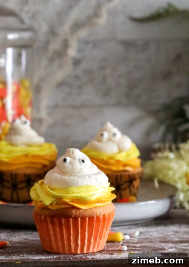Spooky Ghost Cupcakes 4 Festive Halloween cupcakes with ghost frosting and edible eyes