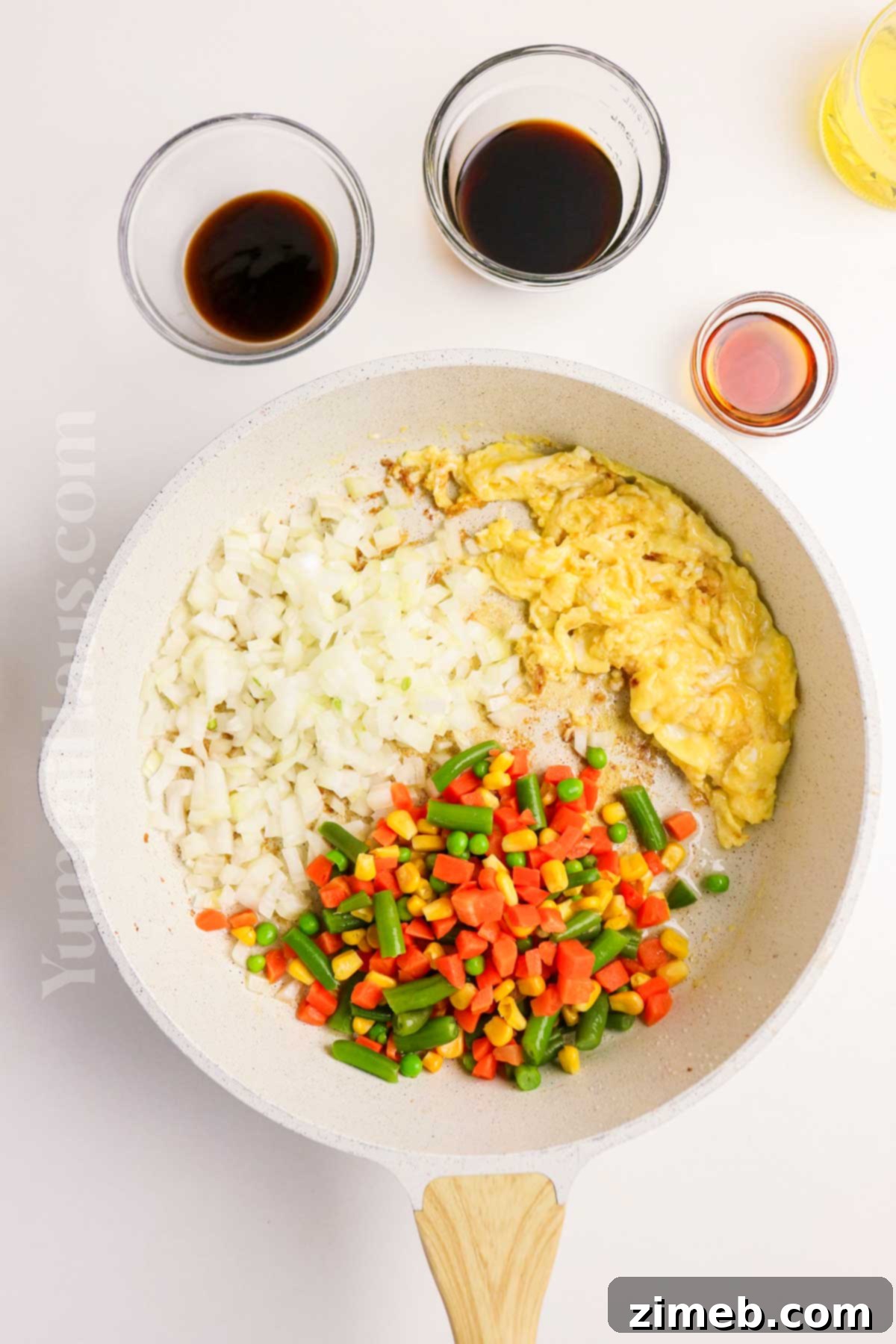 Shrimp and Chicken Stir-Fry Rice Bowl 6 Adding Vegetables to Fried Rice