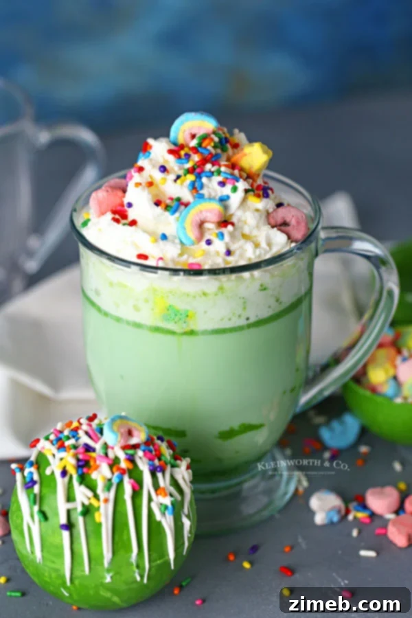 Lucky Bites: 15 Irresistible Green Treats for St. Patrick's Day 12 St. Patrick's Day Hot Cocoa Bombs with rainbow marshmallows